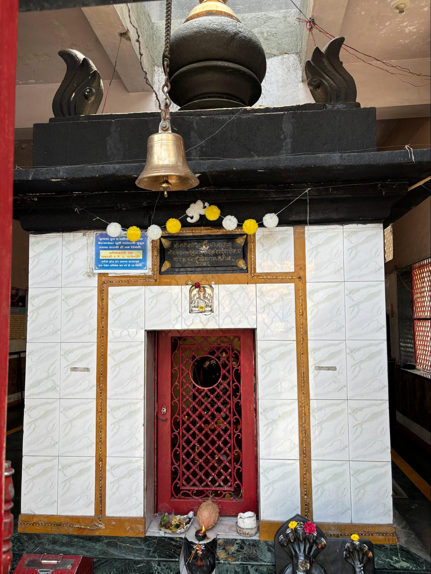 Front view of the Dagdi Nagoba Mandir of Ganesh Peth, Pune showing the original shikhara and tiled exterior walls. (Source: CKA Archives)