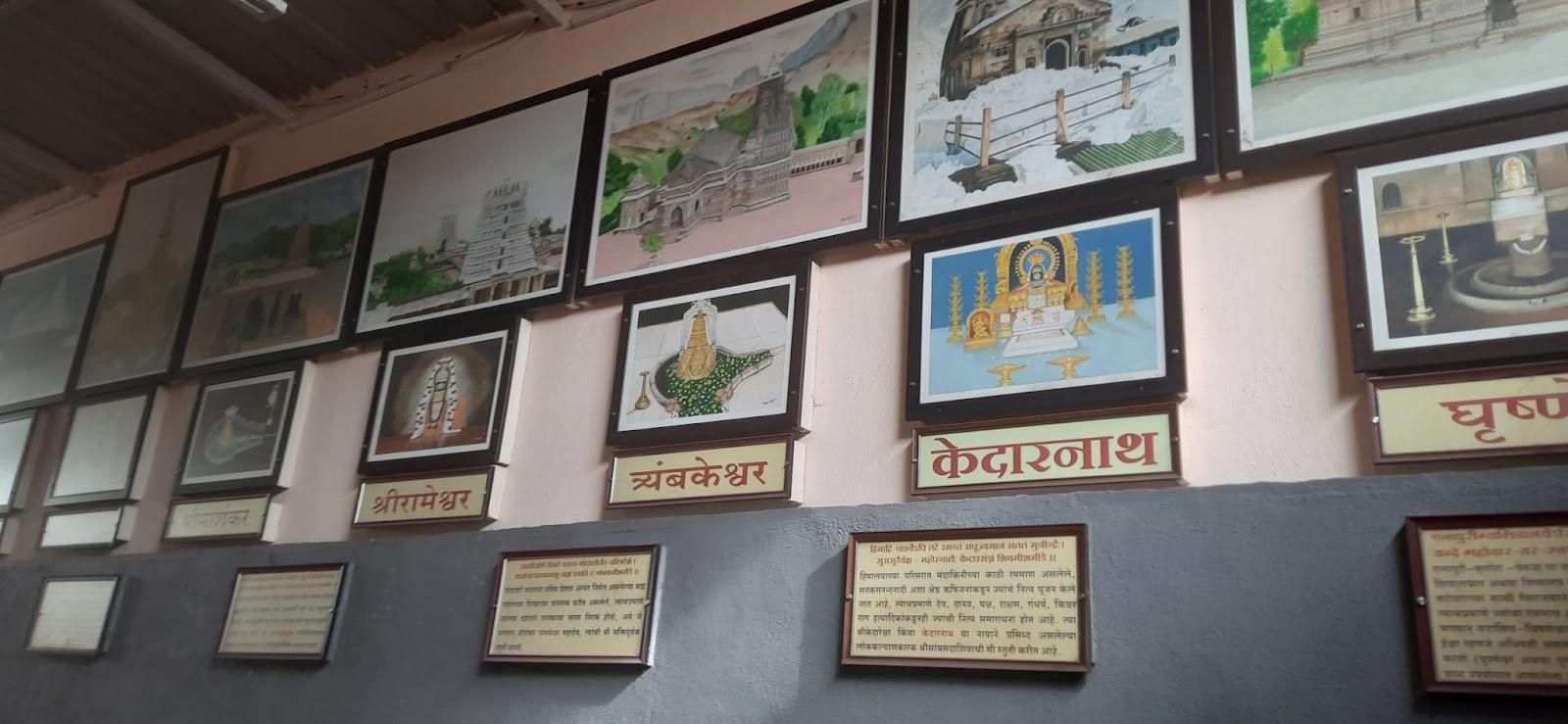 Wall-mounted frames contain printed photographs and brief notes on major Mandirs across India. The collection appears to be locally compiled, with typewritten labels. (Source: CKA Archives)