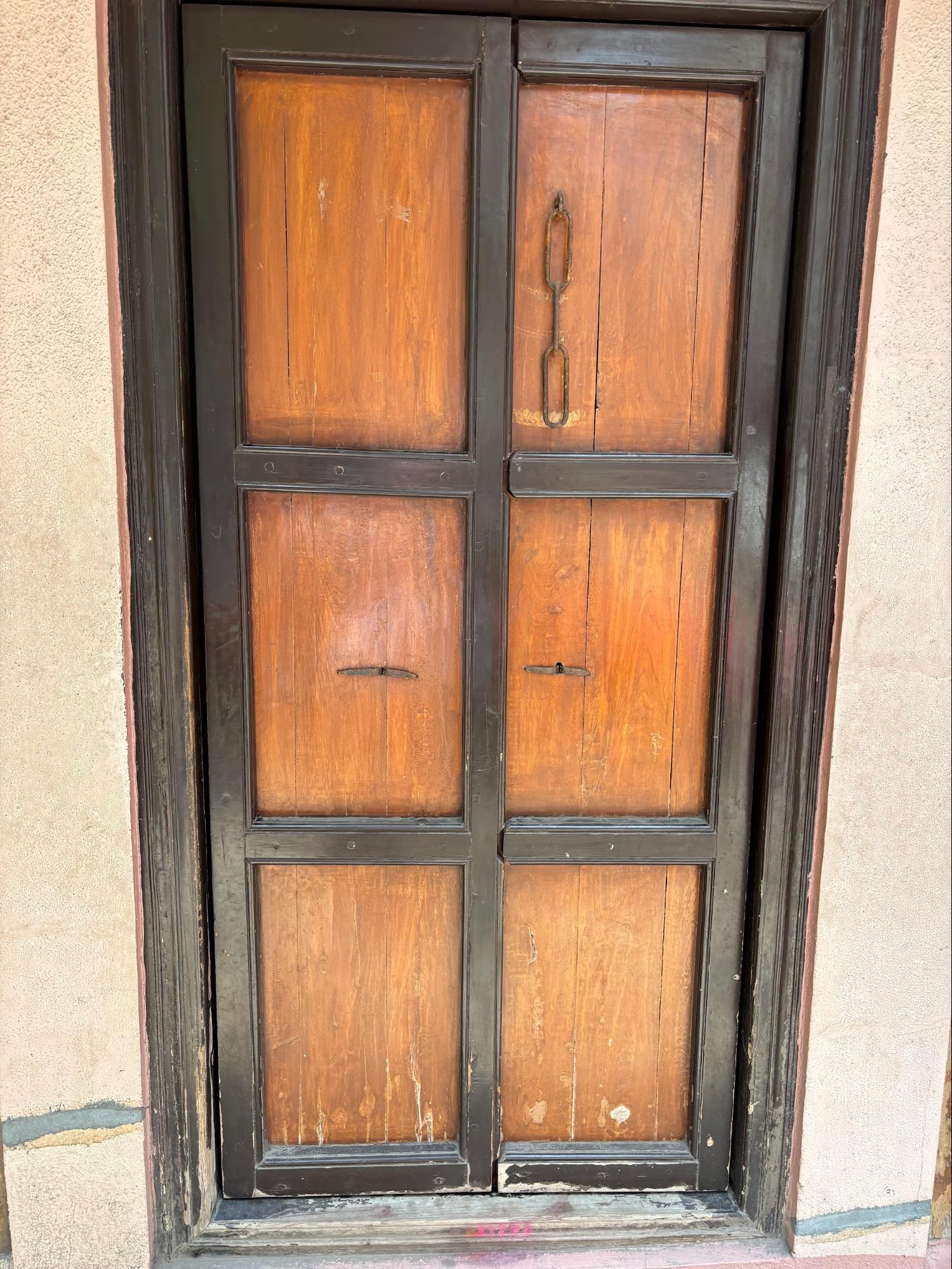 Wooden door at the entrance of Gundacha Ganpati Mandir, typical of traditional architecture in Pune’s Peth areas. (Source: CKA Archives)