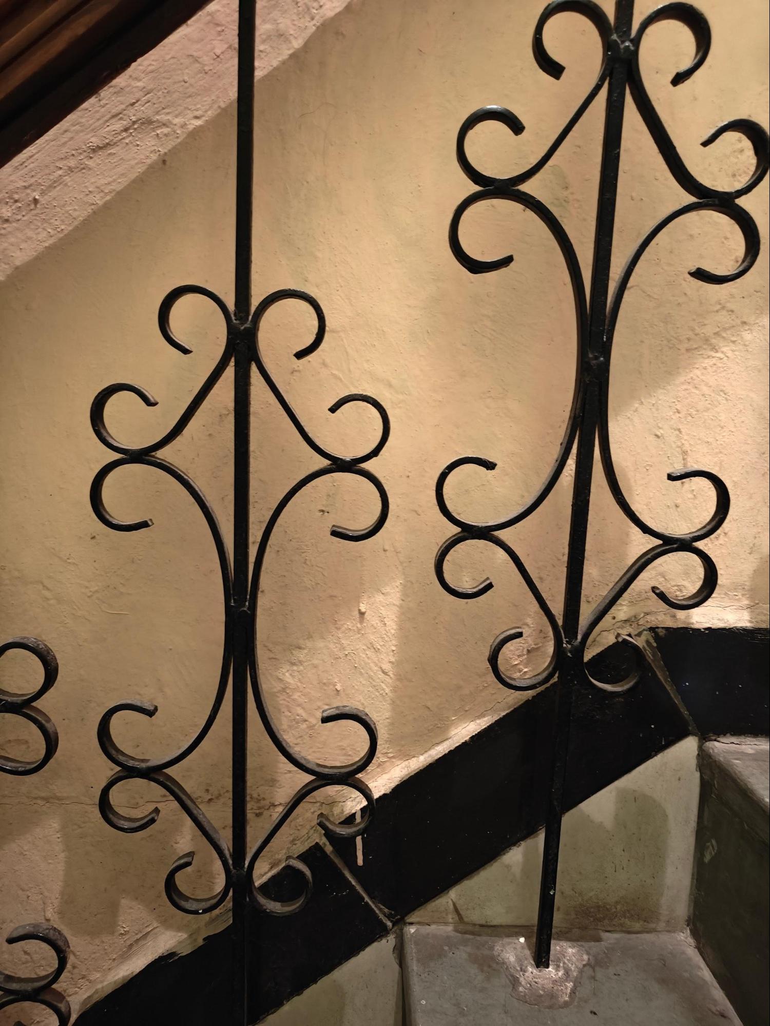 Close up of the iron railing at the staircase. (Source: CKA Archives)
