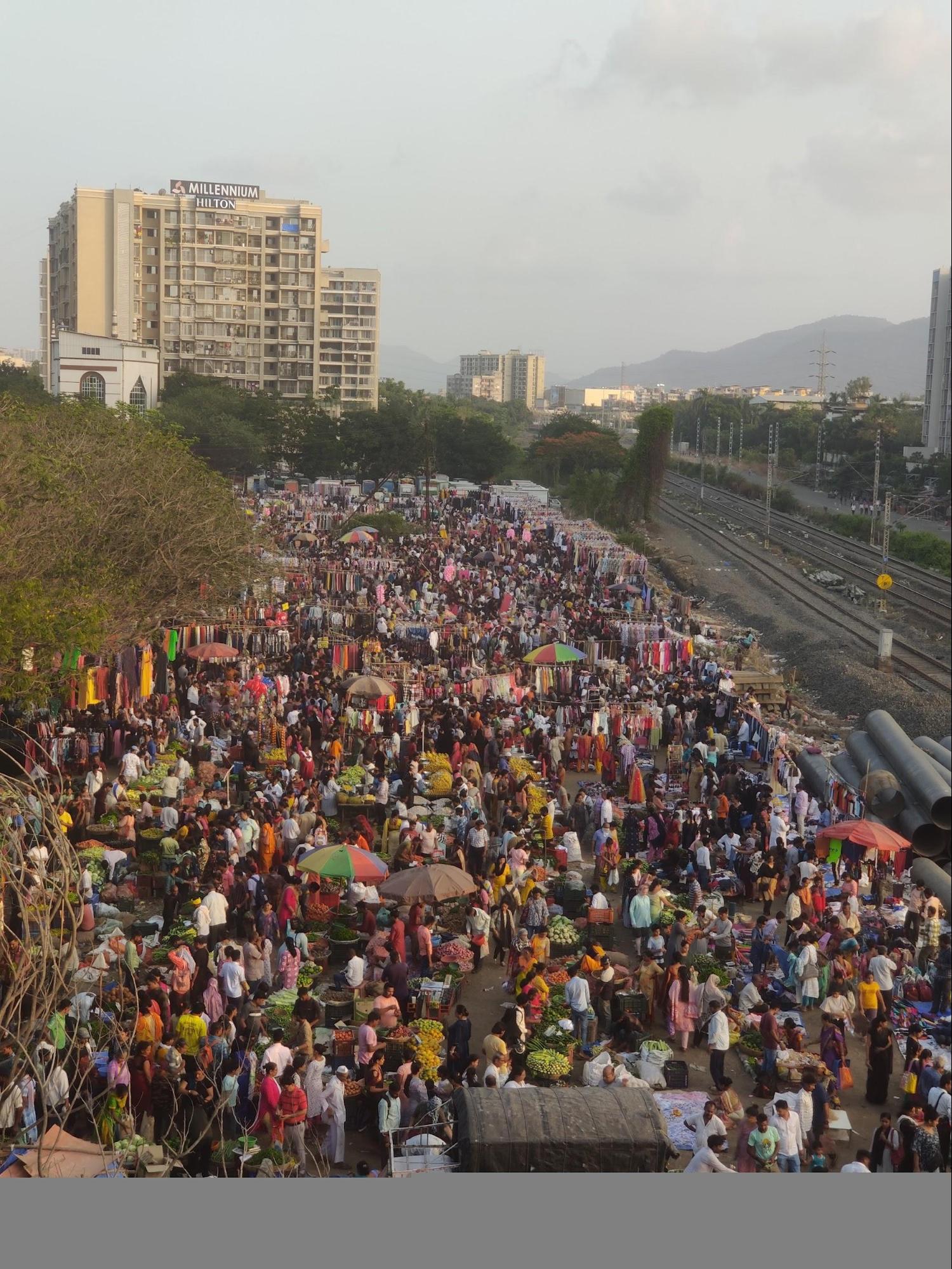 Friday market in Panvel bustling with vendors selling vegetables, flowers, toys, and local goods. (Source: CKA Archives)