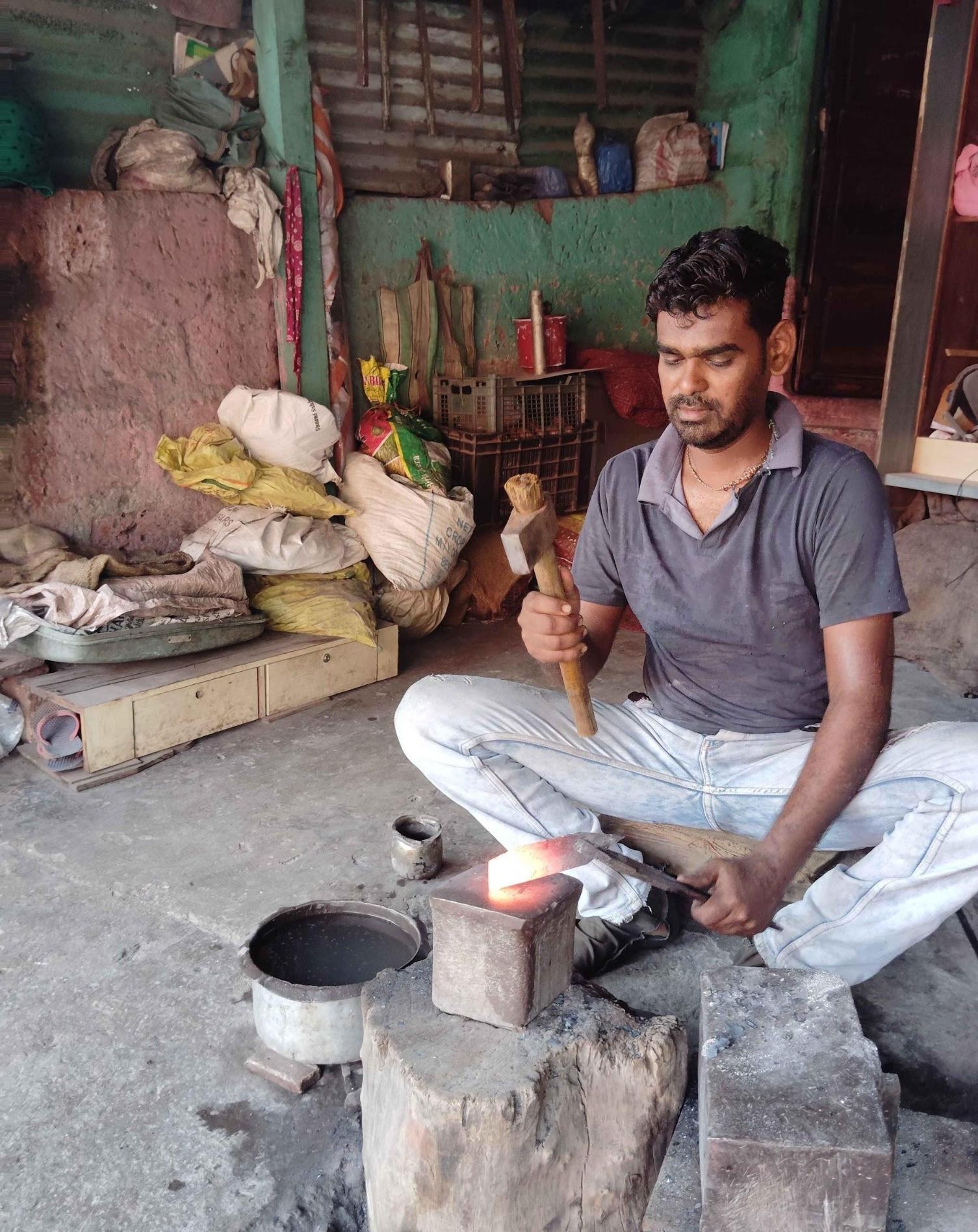 An implement used for peeling coconuts being made by aLohar. (Source: CKA Archives)