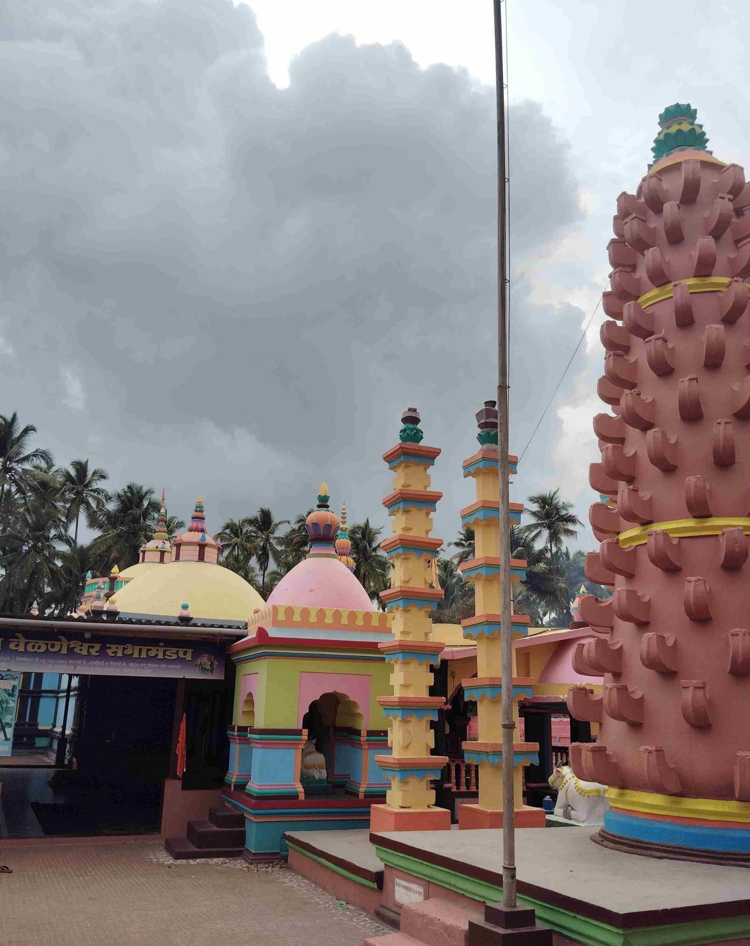 Another shot of the pillars and deepmals (stone lamp towers) that surround the Velneshwar Mandir. (Source: CKA Archives)