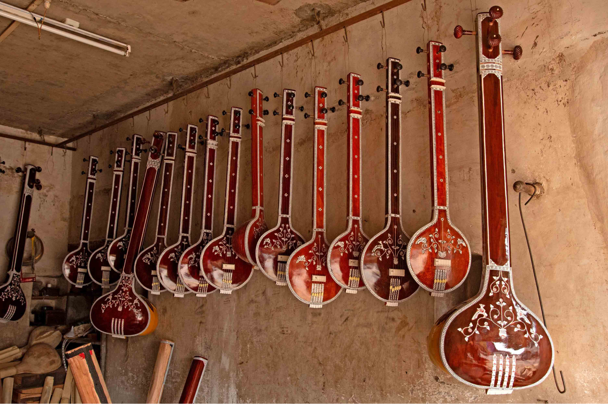 Tanpuras displayed at a workshop in Sitarmaker Galli, Miraj.