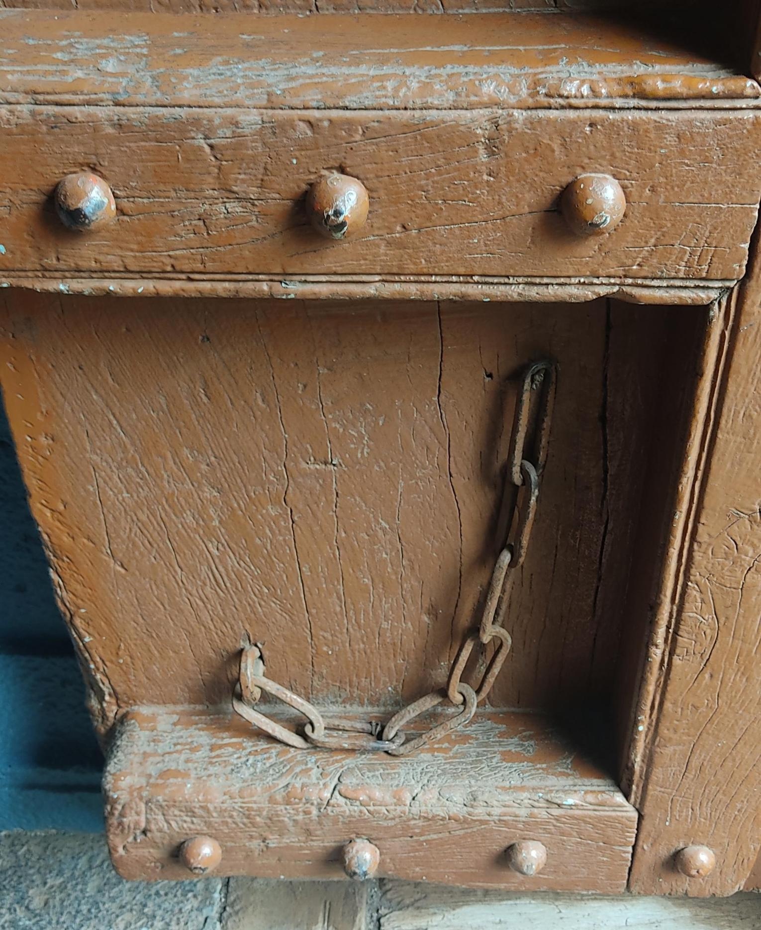 There is also an iron chain, used to secure the door. (Source: CKA Archives)