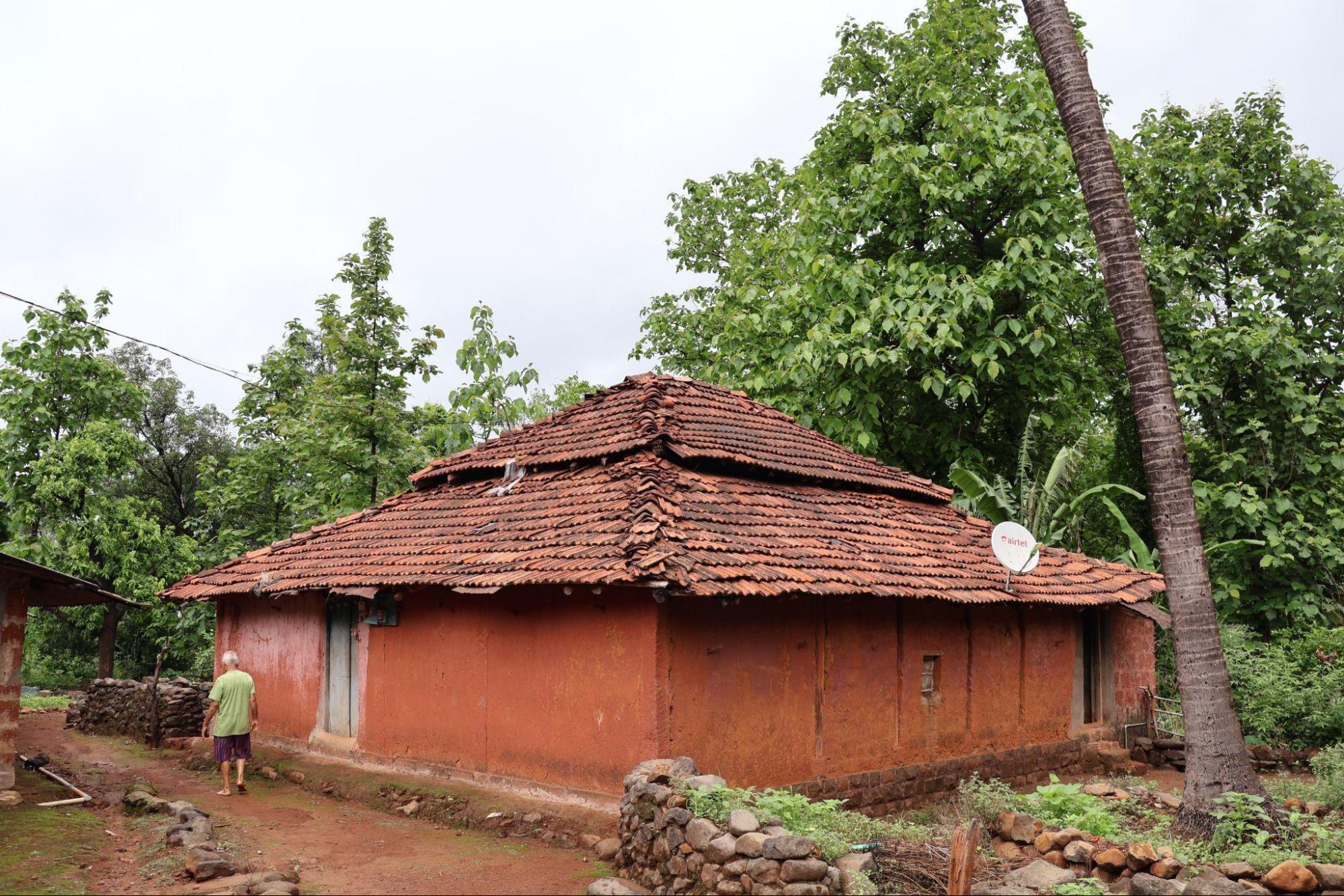 Overlapping tiles and extended eaves help manage rainfall and protect the walls below. (Source: CKA Archives)