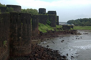 Vijaydurg Fort, a key stronghold of the Maratha navy along the Konkan coast, with laterite walls rising from the Vaghotan Creek.[1]