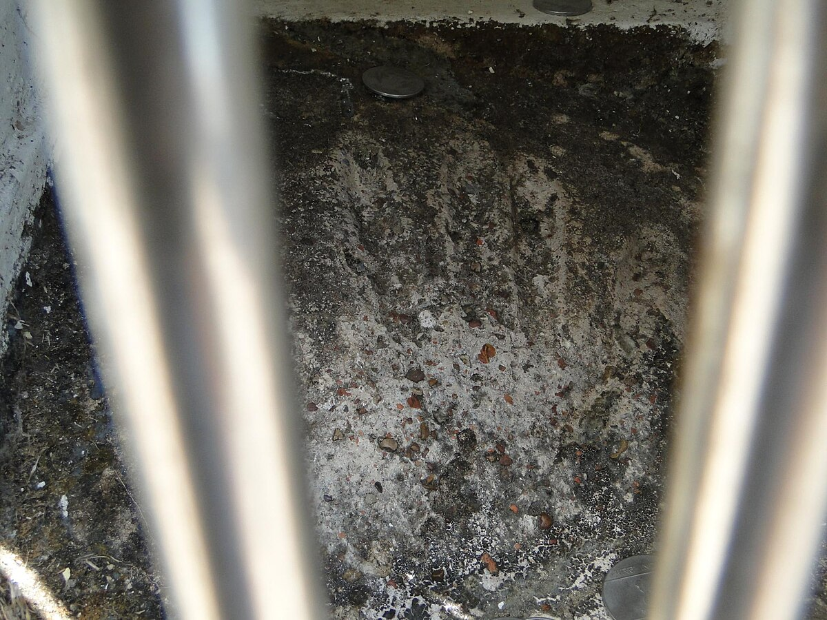 Handprint of Shivaji Maharaj preserved on a slab within Sindhudurg Fort.