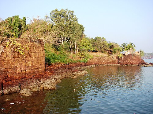 Outer wall of Devgad Fort, Sindhudurg, facing the sea, positioned along the edge of the headland.