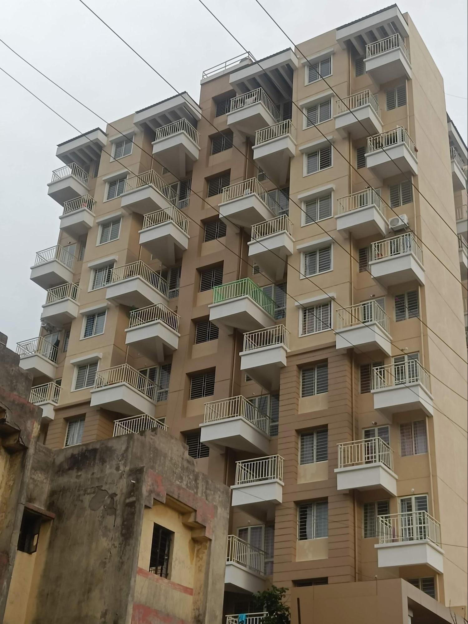 Windows with aluminum shutters, MS grill, and RCC chajja. (Source: CKA Archives)