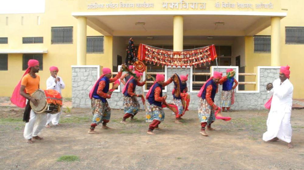 Members of the Dhangar community performing Dhangari Gaja, a folk dance form known for its energetic drumming and storytelling elements.[1]