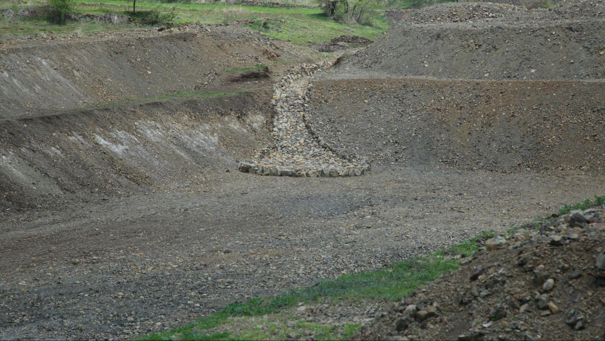 A manually made farm pond for catching and trapping Rainwater in the village of Mandavkhel