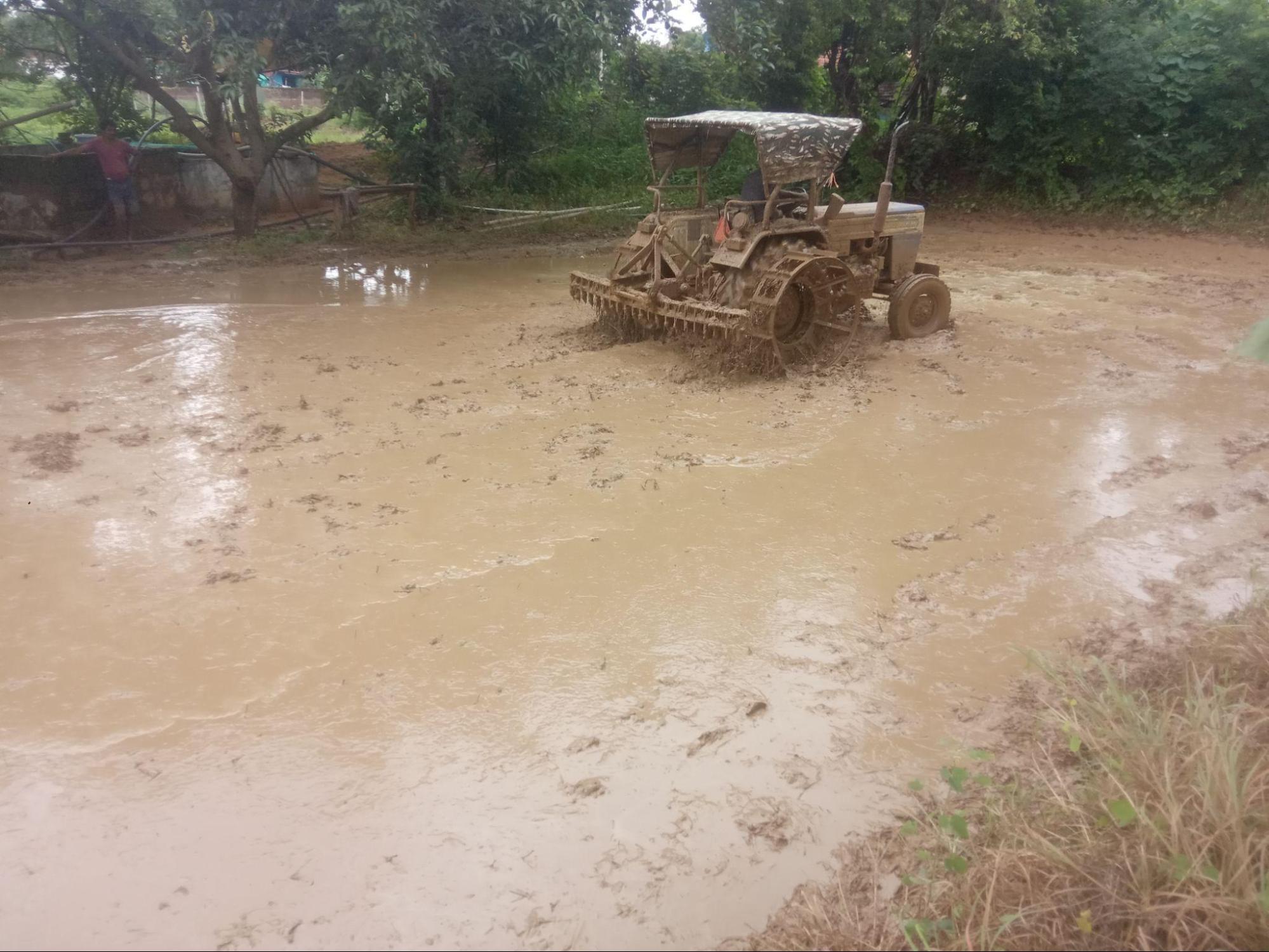 The process of Pudding is carried out with the help of a tractor in the village of Bhagi. (Source: CKA Archives)