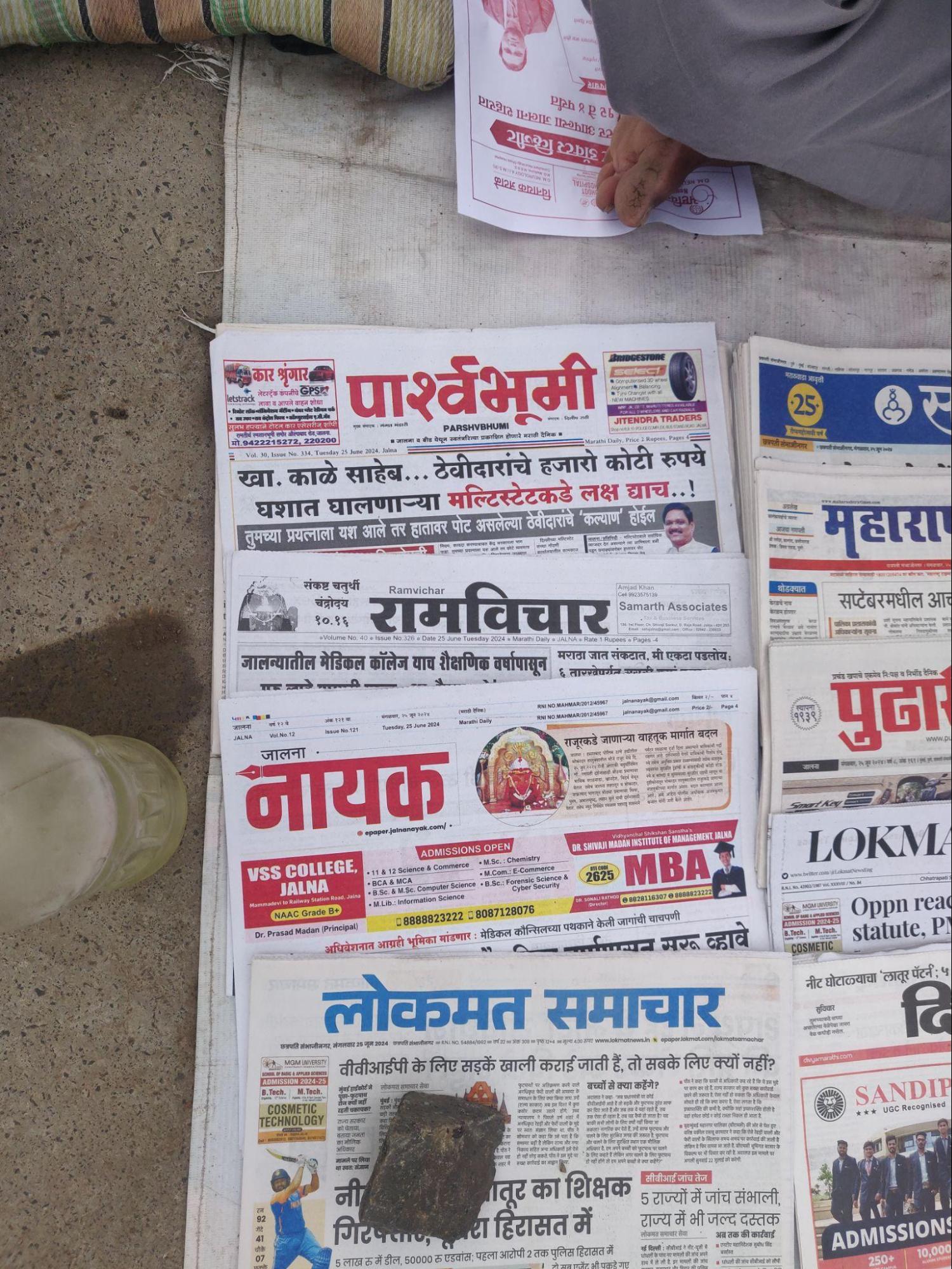 Copies of Jalna’s local newspapers laid out for sale. (Source: CKA Archives)