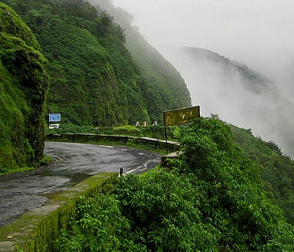 Amboli Pass road winding through misty hills — this staging post linked Sindhudurg’s ports to Belgaum and inland markets during British rule.(Source: CKA Archives)