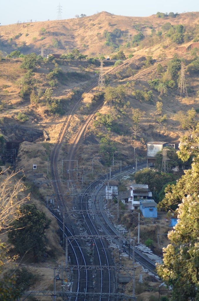 Present-day view of a safety track on the Thul Ghat incline (Kasara–Igatpuri section), Mumbai Division, Central Railway. This mountainous stretch follows the historic route developed during the 19th century, when Lieutenant Chapman extended the road from Kasara (Thane district) to Igatpuri (Nashik district). Today, the same corridor remains vital for both rail and road transport. Fascinatingly, one of India's longest road tunnels has been built on this route, in Kasara itself. The tunnel is said to be 7.7 km long which makes it the longest road tunnel in Maharashtra.